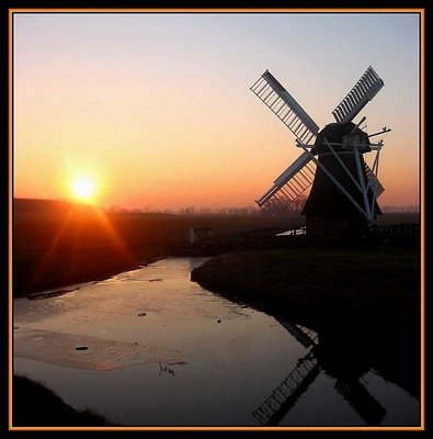 Mill in sunset