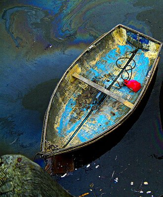 Boat in oil slick 2