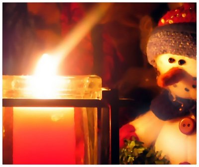 Snowman and candle light