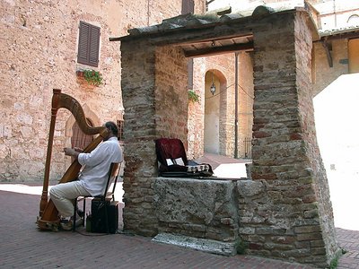 Playing harp in San Gimignano