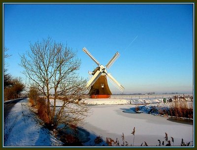 Mill in winterlandscape