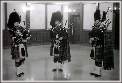 Low-light, Hand-held Inside Bagpipers