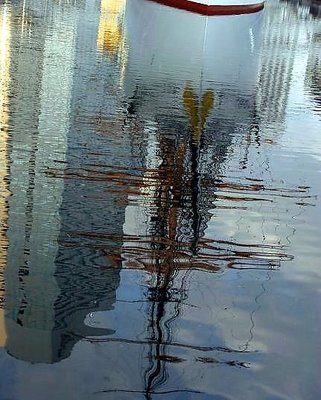 Reflected sail boat.