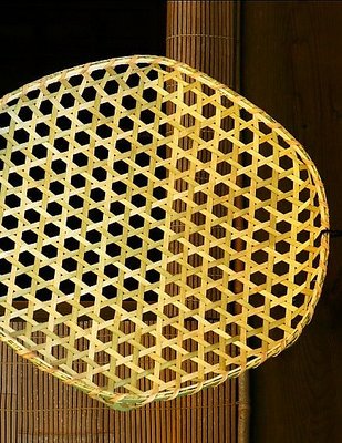 Flat bamboo basket.