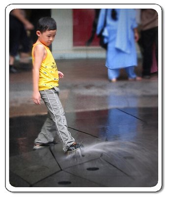 Kid playing with water #3