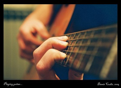 Playing guitar...