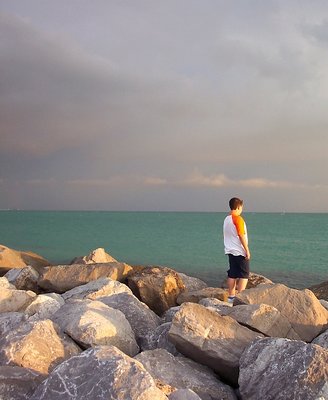 Boy On The Jetty