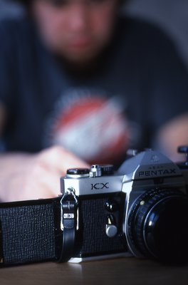 a man with a still camera