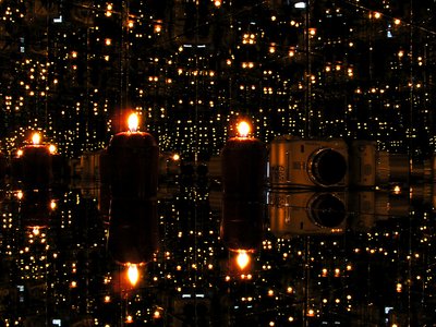 One candle reflection