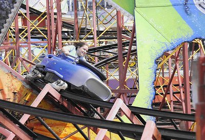 'Savanna riding the roller coaster at Wildwood'