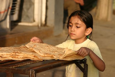 little girl at bakery