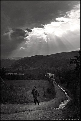 Traveler on the road - Mountain Country