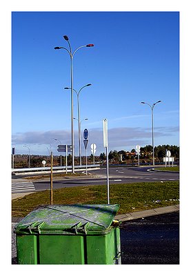 Lamp posts and garbage can at a border town