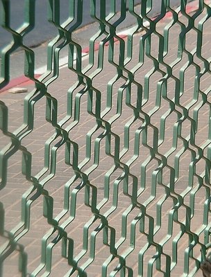 Green iron fence