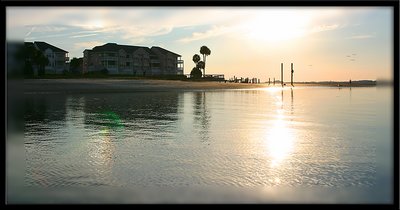 Low Tide And Setting Sun