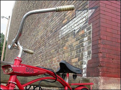satan rides a bike