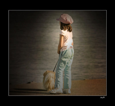 A girl with a pink hat