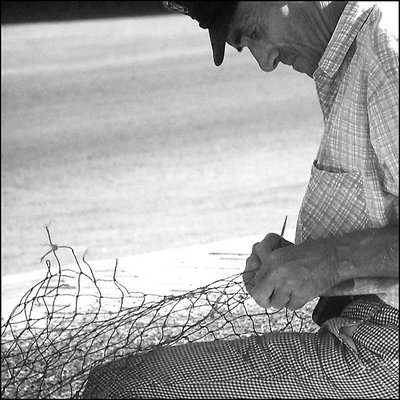 Pescatore - Riparare le reti