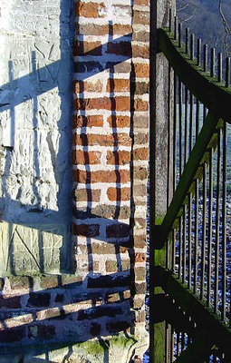 shadow of an old fence