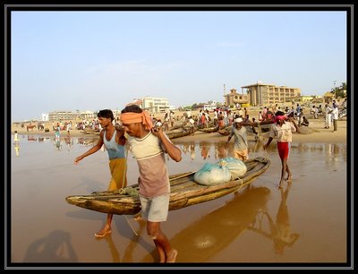 Fishermen and their boat