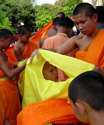 Changing into the Saffron Robe