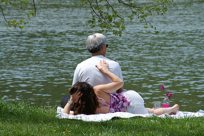 Unknown couple on the river bank
