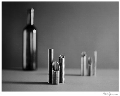 lifeless pipes & an empty wine bottle