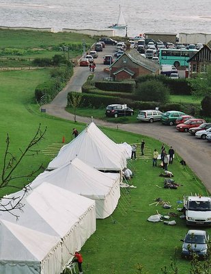 Tent cars and  a boat