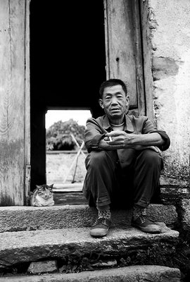 Farmer with his cat in Chaji