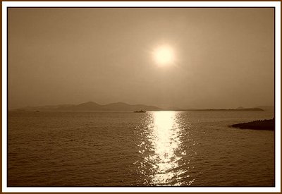 the sun is setting ....in sepia