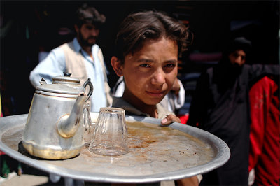 the boy selling coffee.