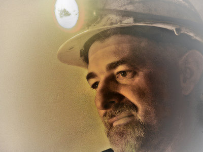 The Portrait Of A Miner