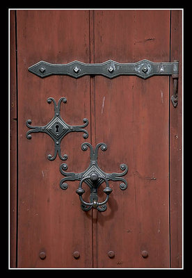 Red Door with Ornate Hardware