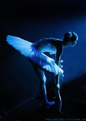 Ballerina in blue light