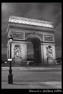 The Arc de T at night