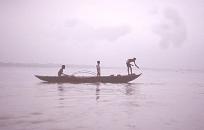 Fishermen on the Ganges at sunset