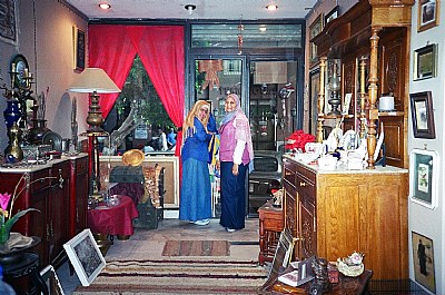Friends with crowded antiques