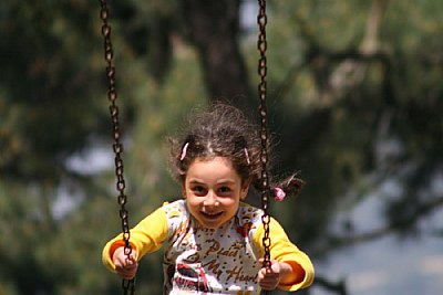 child in the swing