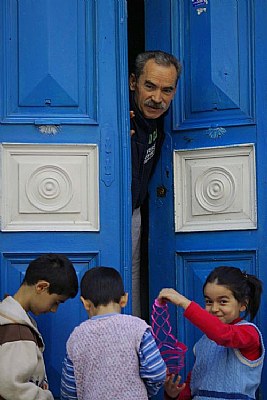 blue door and a family