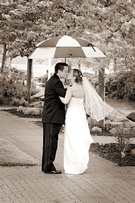 Just KISSING in the rain...