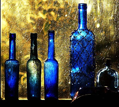 Blue Bottles in Sunset