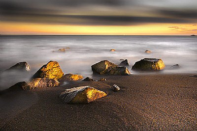 Beach of gold stones 
