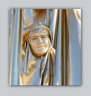 gold man with moderately intelligent expression