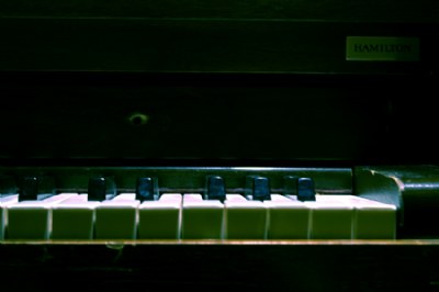 Piano in a Concrete Stairwell