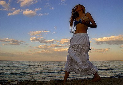 Dance with sunset and the sea