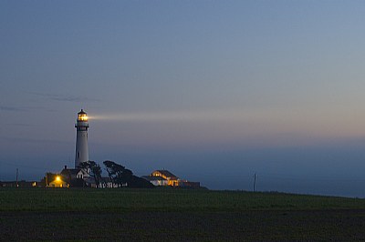 Lighthouse In Mist