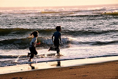 Children Run in Surf