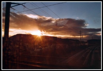 Hopelessly chasing the remote sun by riding the railway