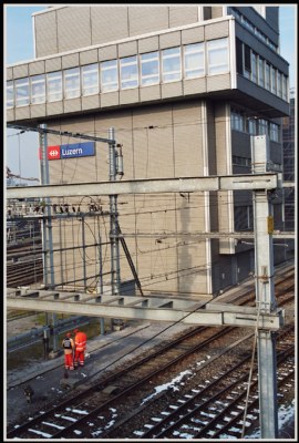 Two workers under the tower