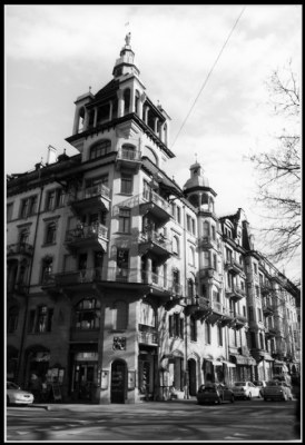 A house with a tower at the corner